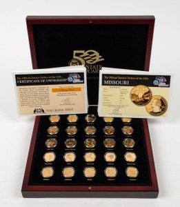 The 50 State Quarters 1999 - 2008 Gold Plated Coin Collection by Macquarie Mint: in impressive presentation case. All coins are official US legal tender struck by the United States Mint, subsequently enhanced with 24-carat gold plating. Limited to only 10,000 sets. With Certificate and documentation.