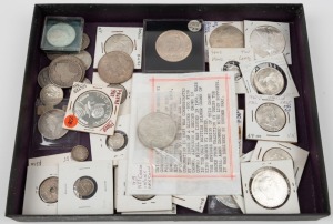 WORLD SILVER COINS: An accumulation including CHINA, INDIA, GREAT BRITAIN, SOUTH AFRICA, U.S.A., NEW ZEALAND, NEW GUINEA, etc. (45 coins); mixed condition, some very nice grades. Approx. 500+ grams.