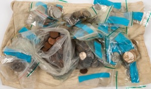 An accumulation of foreign coins, mainly trip-leftovers, plus a quantity of Australian 1c, 2c and 5c coins. Approx. weight 3kg.