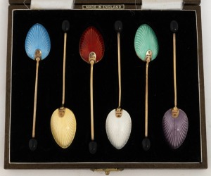 A set of six English sterling silver and enamel coffee spoons, in original plush fitted box, the box 15cm wide