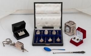 Boxed set of six sterling silver seal top spoons, together with a sterling silver cased clock, a silver and blue enamel spoon, boot hook, silver plated candle snuff, silver brooch and pair of earrings, 19th and 20th century, (7 items)