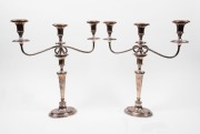 A pair of antique English Sheffield plate three branch candelabra, 19th century, ​​​​​​​47cm high, 45cm wide