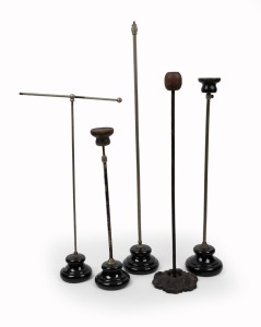 Five assorted vintage and antique shop display stands, 19th/20th century, the largest 73cm high.