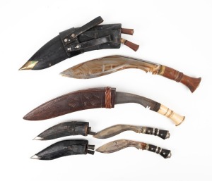 Four assorted Nepalese kukri knives, the largest 44cm overall