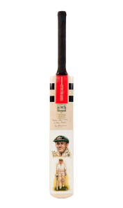 DON BRADMAN: "Gray-Nicolls" Cricket Bat with canvas affixed to blade with two hand-painted portraits of Don Bradman, initialled "YL", endorsed at top "Thanks & Best Wishes to Gray Nicolls, Don Bradman". VG condition.