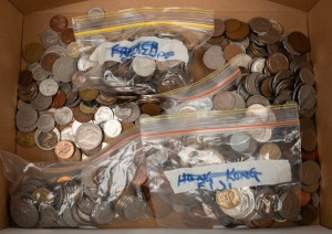 All world coins in small box; noted G.B. New Zealand, Fiji, Europe, Asia, etc. Over 3.56kg.