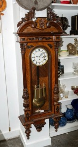 An impressive antique Vienna regulator wall clock in walnut case with three train weight driven movement, an imposing 227cm.