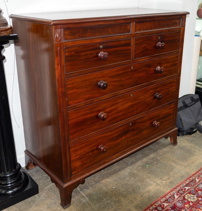 A Regency mahogany tallboy chest with seven drawers, lotus carved patarae, incised stiles and bracket feet, circa 1835, 116cm high, 118cm wide, 55cm deep