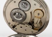 An antique English oversized pocket watch in silvered case with Roman numerals, housed in original mahogany travel case branded "Goldsmiths & Silversmiths Company Ltd.", 19th century, the case 14cm high overall - 3