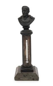 An antique figural desk thermometer, cast bronze and hard stone, 19th century, 22.5cm high