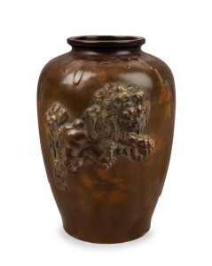 A Japanese bronze vase adorned with lion and gilded highlights, 20th century, signed in cartouche on the side with additional gilt inscription to base, 25cm high