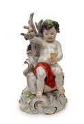 MEISSEN antique German porcelain Bacchanalian cupid statue, 19th century, blue crossed swords mark to base, ​​​​​​​19cm high