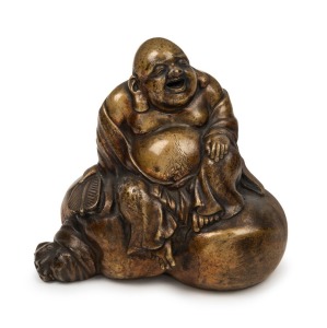 An antique Chinese seated bronze buddha statue, Qing Dynasty, 19th century, 13cm high