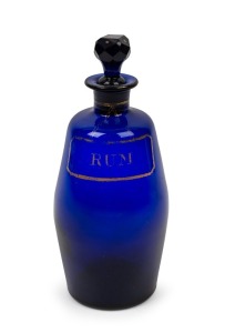 A Georgian rum decanter, Bristol blue glass with hand-painted gilt label, 18th/19th century, 20cm high