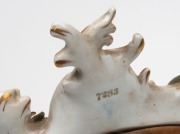 An antique German porcelain table mirror with applied cherubs and flowers, 19th century, 31cm high - 3