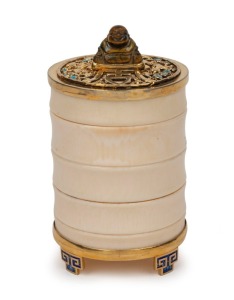 A vintage Chinese turned ivory canister with silver gilt base and top adorned with enamel and carved tiger's eye seated Buddha finial, 20th century, stamped to the base "Made in China, Silver", 12cm high