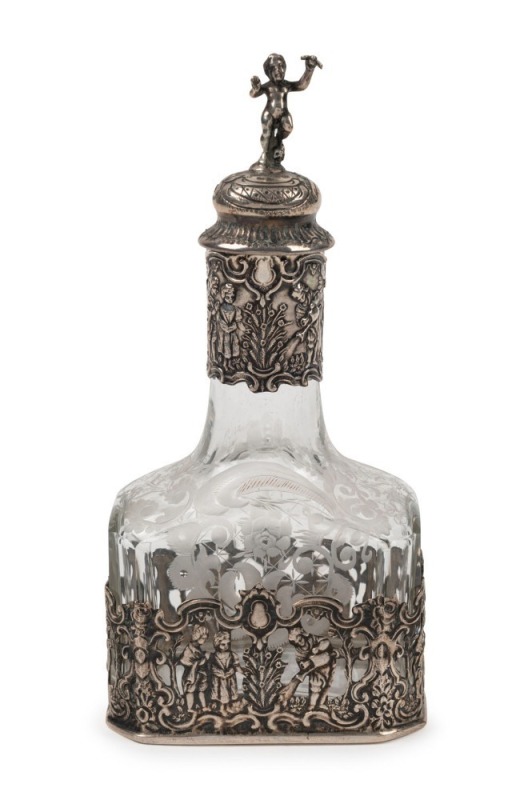 An antique Dutch silver mounted engraved scent bottle, 19th century, 15cm high