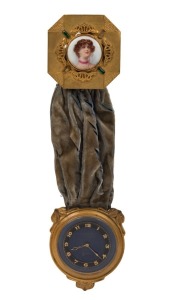 An antique boudoir wall clock, eight day Swiss movement in gilt metal case with blue velvet hanger and hand-painted porcelain female portrait top in gilt metal mount with green stone decoration, late 19th early 20th century, ​​​​​​​26cm high overall