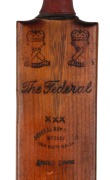 A MATCH-USED BAT SIGNED BY BRADMAN AND HIS NSW STATE XI TEAM AT BATHURST - 15th OCTOBER 1931 A full-size Federal Bat Company "The Federal" bat, dated on the back of the blade "BATHURST&nbsp;15.10.31" and signed by the whole visiting team: Don Bradman (Captain) - 2