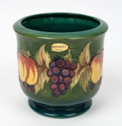 MOORCROFT&nbsp;fruit patterned jardiniere with green ground, late 20th century, factory mark to base, ​​​​​​​17.5cm high