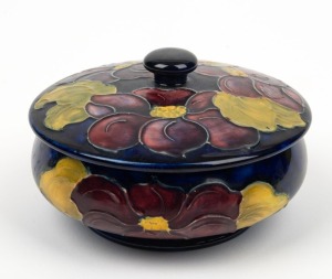 MOORCROFT "Anemone" lidded bowl on blue ground, impressed "Moorcroft, Made In England" 7cm high, 12cm diameter