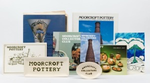 MOORCROFT two pottery dishes emblazoned "MOORCROFT POTTERY" and "MOORCROFT COLLECTOR'S CLUB", plus a reference book on Moorcroft Pottery, (3 items), the larger dish 21cm wide