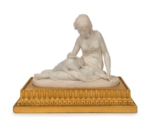 An antique carved marble statue of a reclining lady, mounted on carved gilt wood stand, 19th century,the statue 21cm high, 26cm wide,