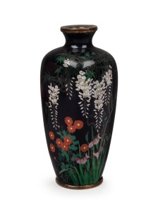 An antique Japanese cloisonne vase with silver wire, adorned with wisterias and flowers on dark blue ground, Meiji Period, 19th/20th century, 12cm high