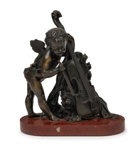 An antique French bronze cupid and cello statue mounted on rouge marble base, 19th century, 23cm high