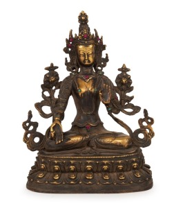 An antique Tibetan bronze seated Buddha statue, adorned with cabochon semi-precious stones, 18th/19th century, 22cm high