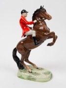 BESWICK English porcelain statue of a huntsman on rearing horse, black factory mark to base, 24cm high - 2