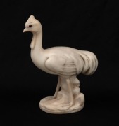 An antique carved marble bird statue with glass eyes, early 20th century, 14cm high
