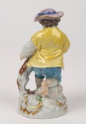 MEISSEN antique German porcelain statue of a boy with a dog, 19th century, blue crossed swords mark to base, 12.5cm high - 2