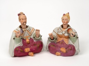 A pair of bisque porcelain "Nodding Head" seated statues, early 20th century, 13cm high