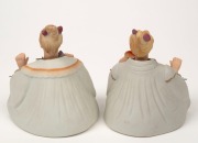 A pair of bisque porcelain "Nodding Head" seated statues, early 20th century, ​​​​​​​13cm high - 2