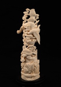 A Chinese carved buffalo bone ornament of cranes in flight, 20th century, ​​​​​​​26.5cm high overall