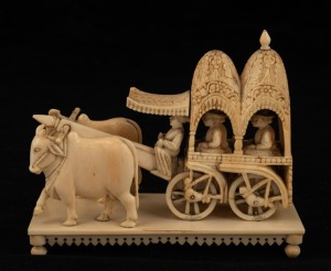 An antique Indian carved ivory wagon ornament, 19th/20th century, ​​​​​​​10cm high, 12.5cm long