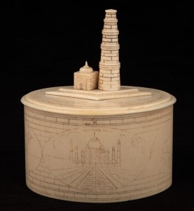 An Indian carved ivory trinket box adorned with architectural finial and vignettes of maps and animals including kangaroo, early to mid 20th century, ​​​​​​​13cm high