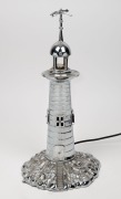 An Art Deco lighthouse lamp, chrome finished cast metal, circa 1930's, ​​​​​​​43cm high
