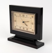 A vintage bakelite cased table clock with spring driven movement, circa 1930, 19cm high, 20cm wide