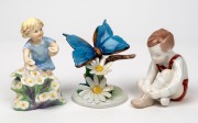 ROYAL WORCESTOR "May" porcelain statue, together with a HEREND butterfly statue and a Continental statue of a boy, 20th century, (3 items), the largest 13cm high