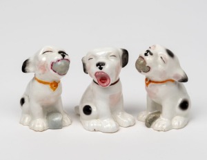 GRAFTON CHINA "Swain's Tuddy" group of three miniature porcelain dog statues, factory mark to bases, 5cm high