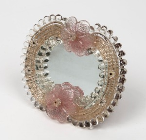 A Venetian glass table mirror with pink florets, early 20th century, ​​​​​​​14 x 16cm