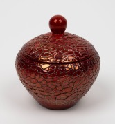 ZSOLNAY Hungarian ruby lustre porcelain lidded jar, factory mark to base, 12cm high