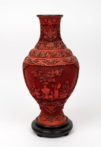 A Chinese cinnabar style vase on wooden stand, 20th century, 42cm high