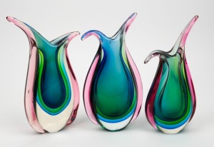A group of three Murano triple sommerso art glass vases with beak tops, the largest 26cm high