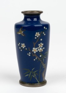 An antique Japanese cloisonne vase with blossoms and bird on blue ground, Meiji Period, 19th/20th century, 8.5cm high