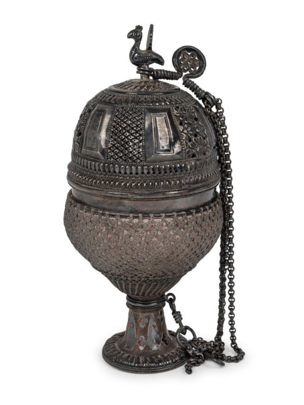 An antique Indo-Persian pierced silver censer with terracotta lining, 19th century, ​​​​​​​21.5cm high