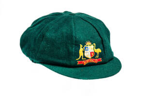 AUSTRALIAN "BAGGY GREEN" TEST CAP, green wool, embroidered Australian Coat-of-Arms on front, made by Albion, player unknown. Good match-used condition. This one has been sent to us from the West Indies.