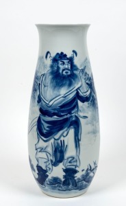 A tall Chinese blue and white porcelain vase decorated with a warrior in landscape, reverse adorned with a poem, Republic Period, 20th century, 47cm high